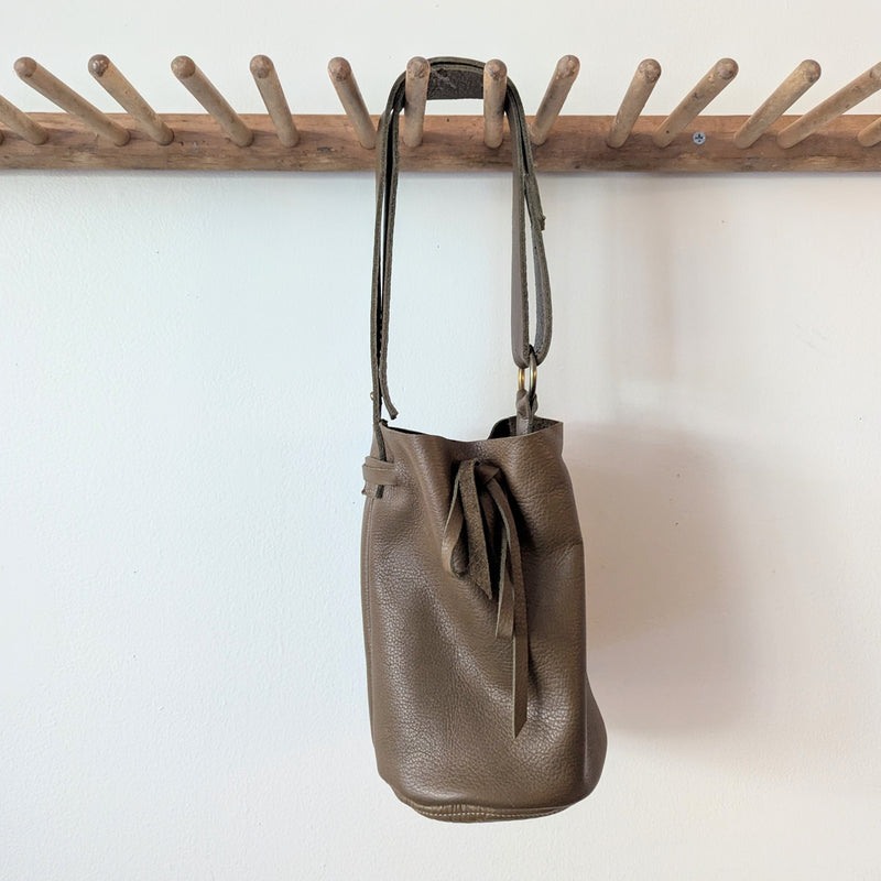 Stitch and Tickle handmade leather cinched bucket bag made in Boston made in usa leatherwork leathercraft SoWa gift shop boutique store