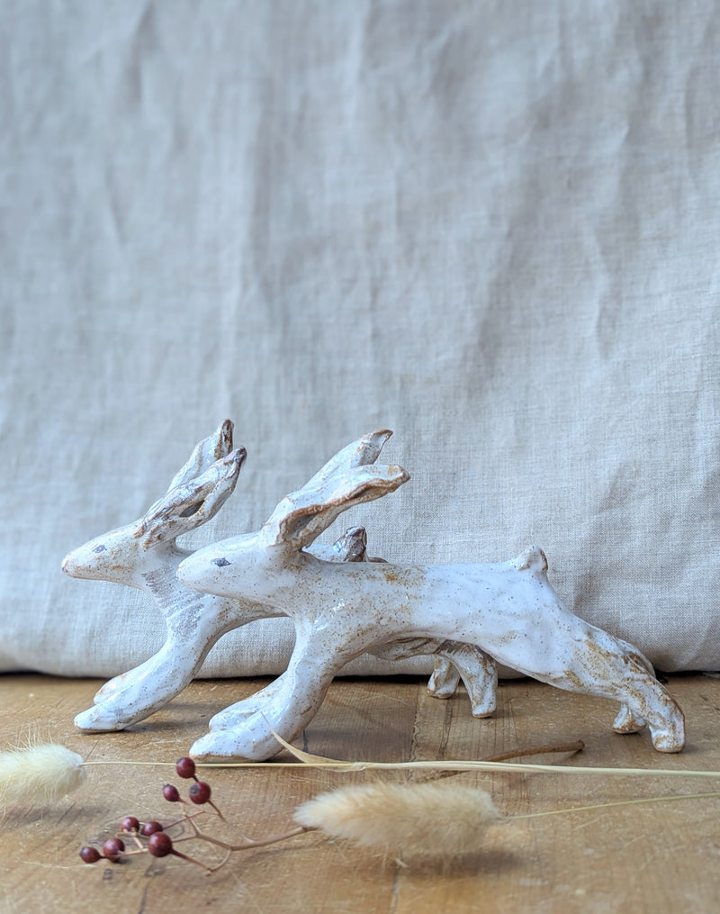 Handmade and hand-painted running rabbit ceramic sculptures by Charlotte salt sowa Boston gift shop boutique store small business