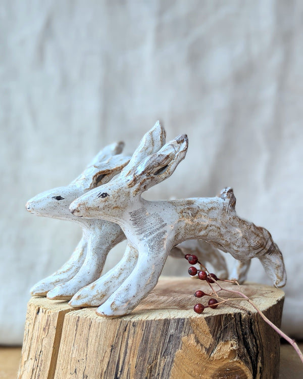 Handmade and hand-painted running rabbit ceramic sculptures by Charlotte salt sowa Boston gift shop boutique store small business