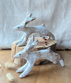 Handmade and hand-painted running rabbit ceramic sculptures by Charlotte salt sowa Boston gift shop boutique store small business