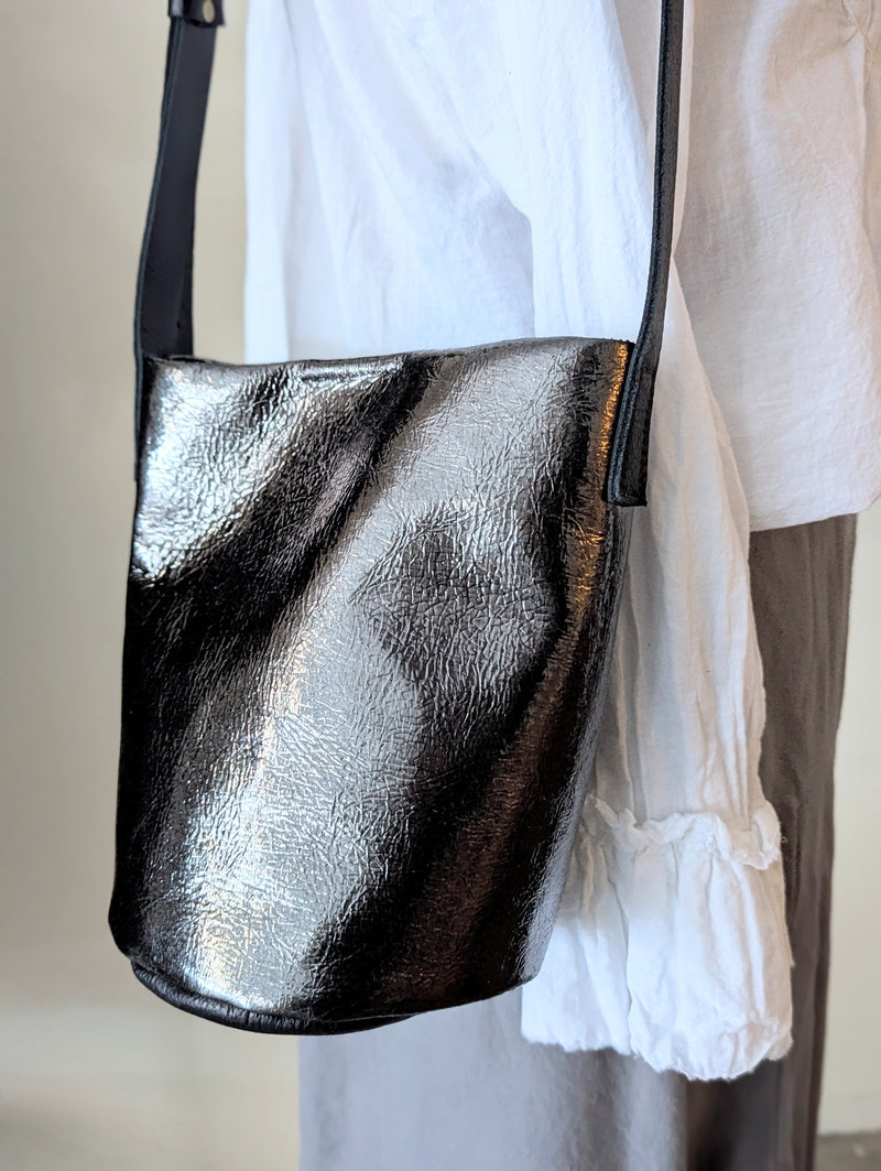 Stitch and Tickle handmade leather metallic bucket bag made in Boston made in usa leatherwork leathercraft SoWa gift shop boutique store