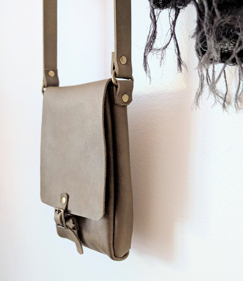 Stitch and Tickle handmade leather vertical narrow mini messenger bag crossbody made in Boston made in usa leatherwork leathercraft SoWa shop boutique gift store