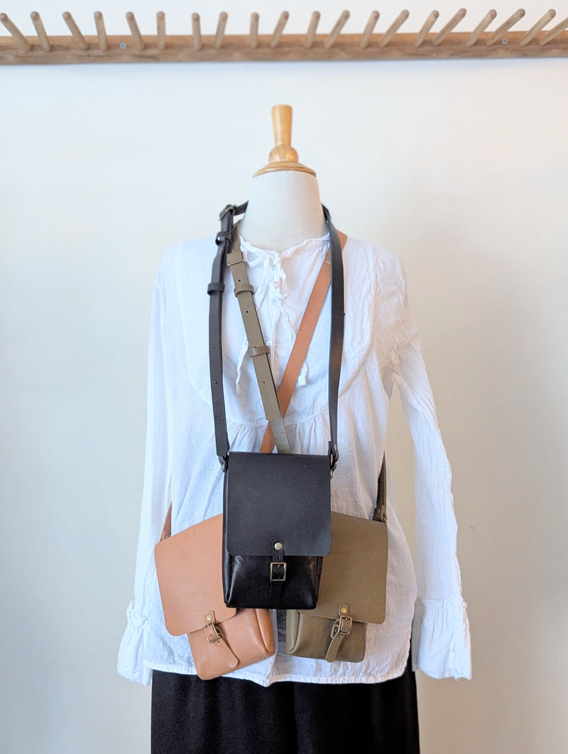 Stitch and Tickle handmade leather mini vertical narrow messenger bag crossbody made in Boston made in usa leatherwork leathercraft SoWa shop boutique gift store