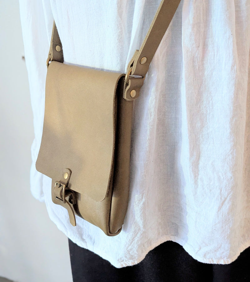 Stitch and Tickle handmade leather vertical narrow mini messenger bag crossbody made in Boston made in usa leatherwork leathercraft SoWa shop boutique gift store