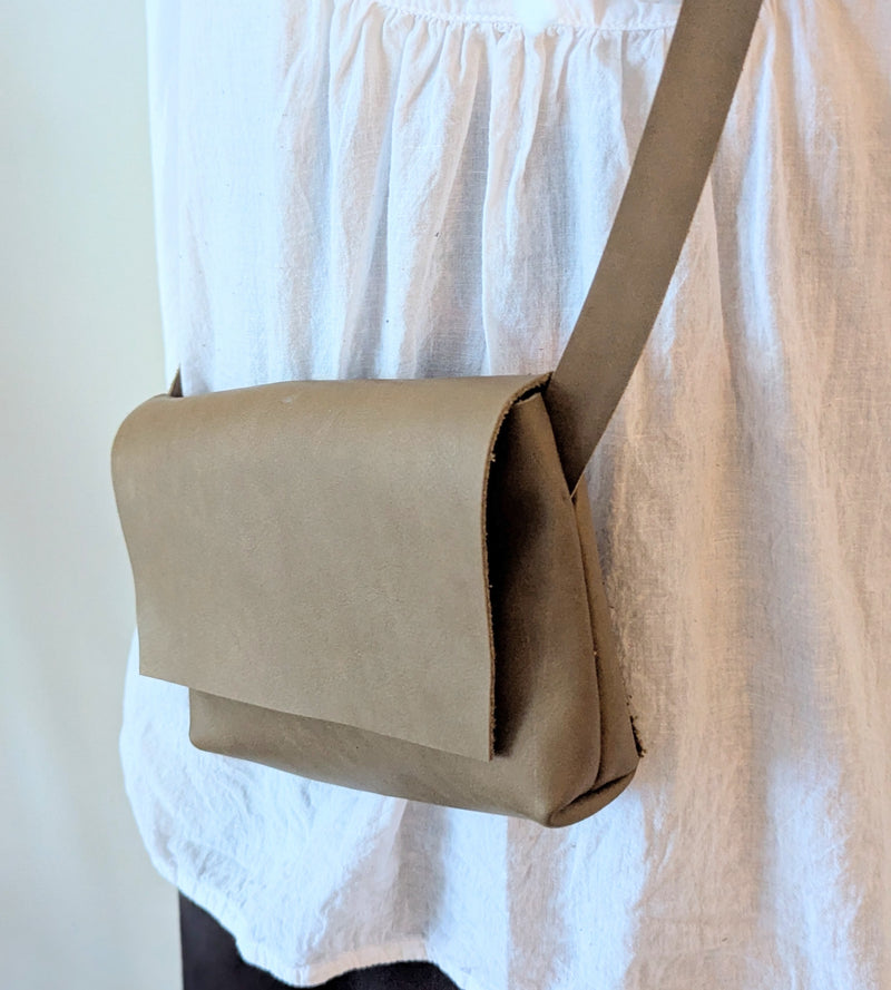 Stitch and Tickle handmade leather mini messenger bag crossbody made in Boston made in usa leatherwork leathercraft SoWa shop boutique gift store