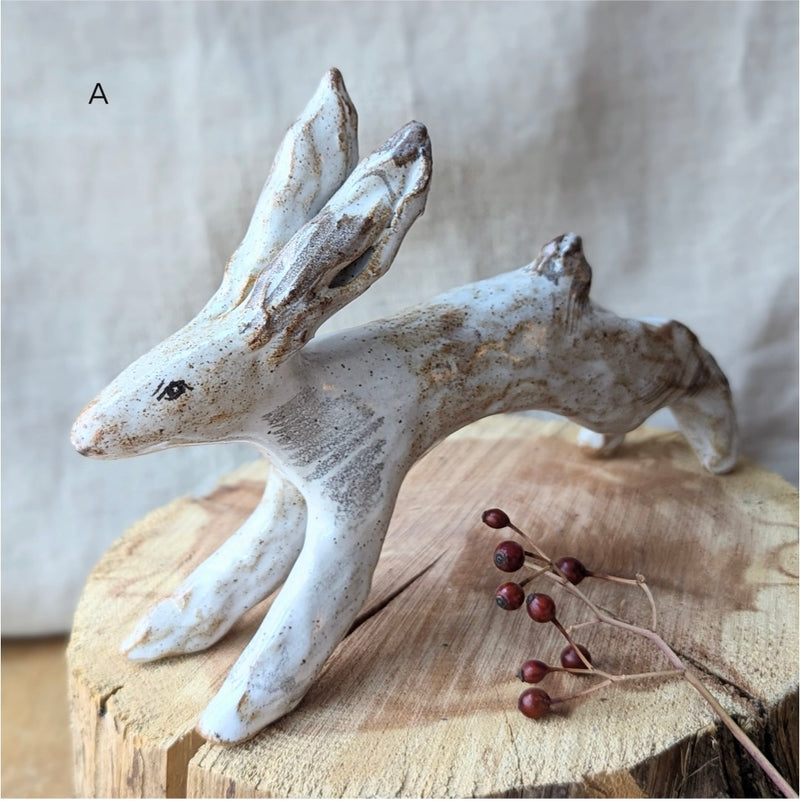 Handmade and hand-painted running rabbit ceramic sculptures by Charlotte salt sowa Boston gift shop boutique store small business