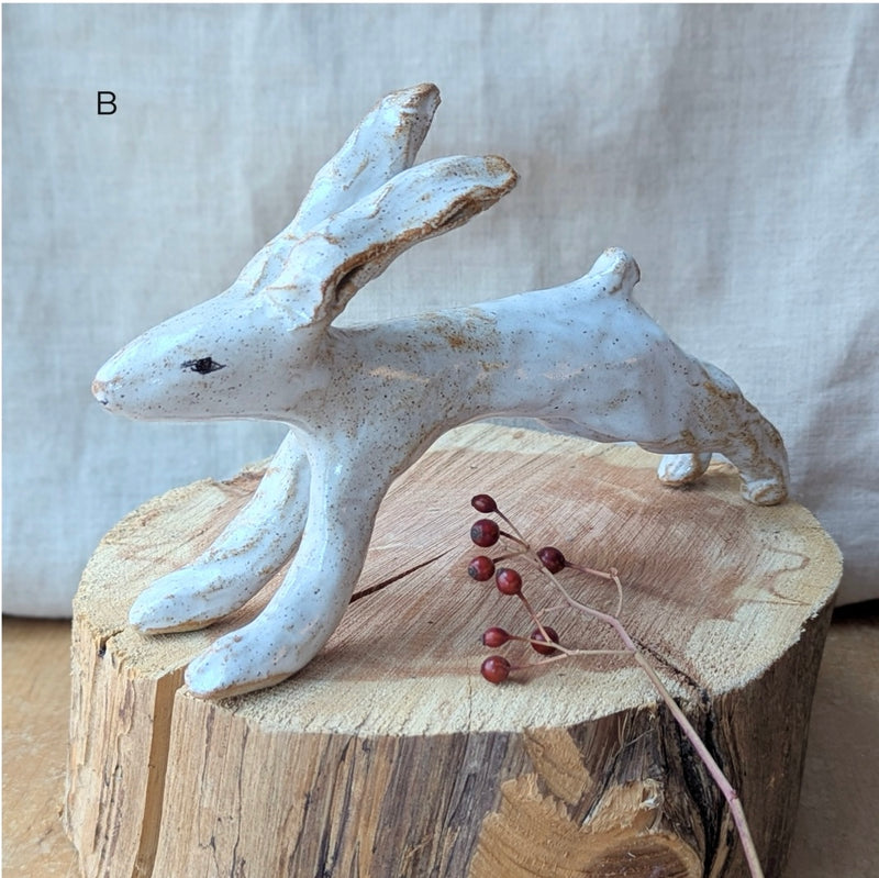 Handmade and hand-painted running rabbit ceramic sculptures by Charlotte salt sowa Boston gift shop boutique store small business