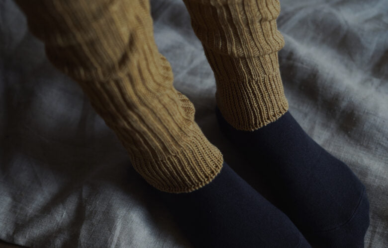 Soft arm and leg warmers made from a blend of cashmere and cotton. Made in Japan.